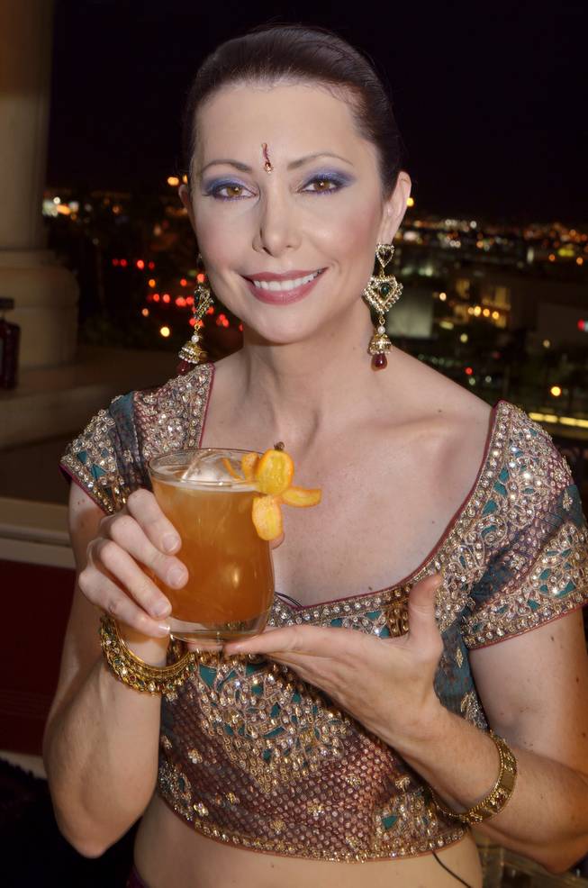 Master Mixologist Patricia Richards of Wynn and Encore poses with her Mai Chai cocktail during The Mixing Star competition sponsored by Disaronno at the Palazzo's Azure Pool on Monday, June 4, 2012.